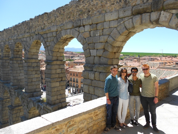 Friends and I with the ancient Roman aqueduct in Segovia.